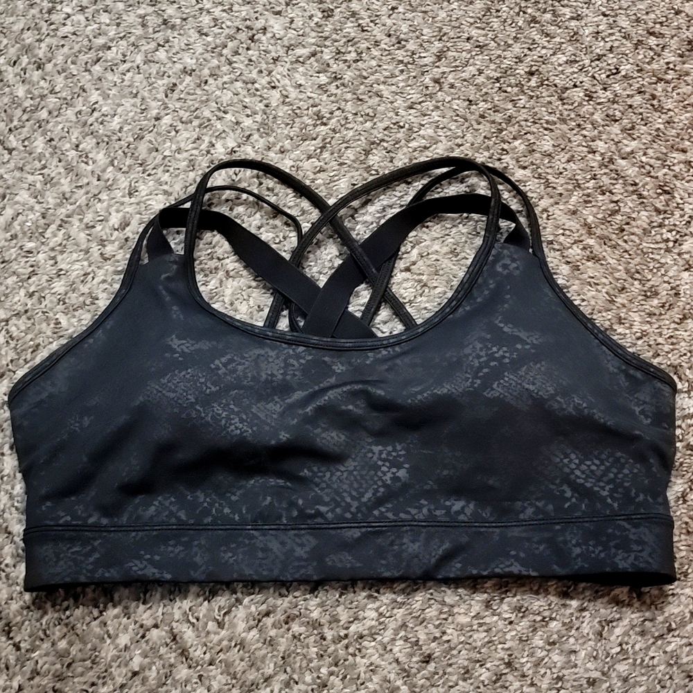 CNS woman's Activewear black leopard sports bra.